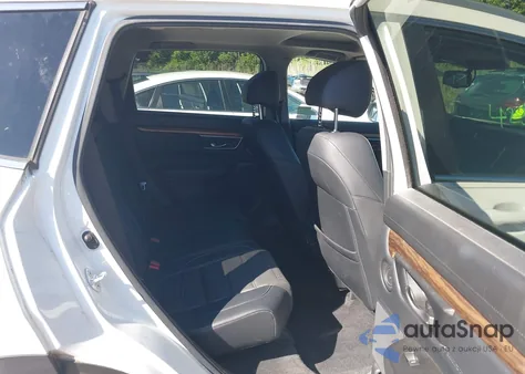 2019 Honda Cr-V Touring z USA, uszkodzony, nr VIN JHLRW2H98KX003911